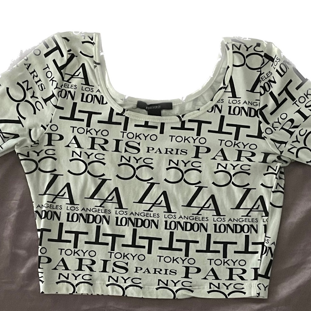 Forever 21 cream crop top with writing.